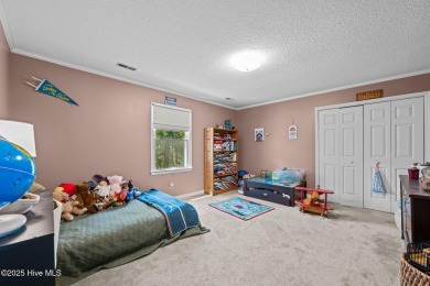Welcome to this spacious 4-bedroom, 2-bath home in the on Harbour Point Golf Club in North Carolina - for sale on GolfHomes.com, golf home, golf lot