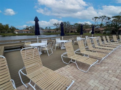 Village Oaks offers a picturesque and tranquil setting, with on Bobby Jones Golf Club in Florida - for sale on GolfHomes.com, golf home, golf lot
