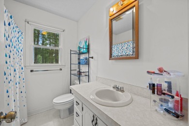 Welcome to this spacious 4-bedroom, 2-bath home in the on Harbour Point Golf Club in North Carolina - for sale on GolfHomes.com, golf home, golf lot