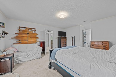 Welcome to this spacious 4-bedroom, 2-bath home in the on Harbour Point Golf Club in North Carolina - for sale on GolfHomes.com, golf home, golf lot
