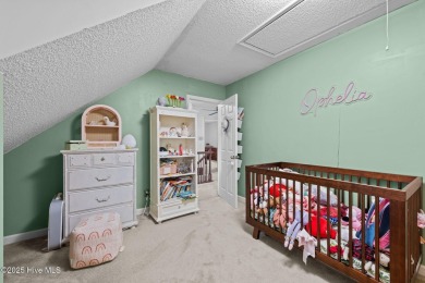 Welcome to this spacious 4-bedroom, 2-bath home in the on Harbour Point Golf Club in North Carolina - for sale on GolfHomes.com, golf home, golf lot