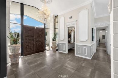 Welcome to the *Island* of Lakewood!
This stunning single-level on Lakewood Country Club and Tennis Center in California - for sale on GolfHomes.com, golf home, golf lot