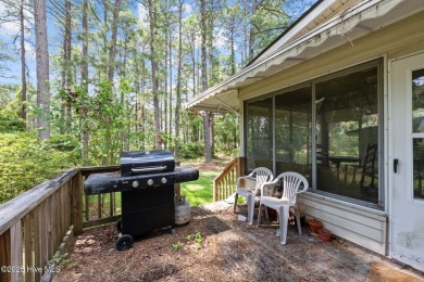 Welcome to this spacious 4-bedroom, 2-bath home in the on Harbour Point Golf Club in North Carolina - for sale on GolfHomes.com, golf home, golf lot