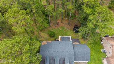 Welcome to this spacious 4-bedroom, 2-bath home in the on Harbour Point Golf Club in North Carolina - for sale on GolfHomes.com, golf home, golf lot