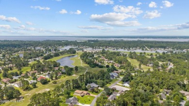 Welcome to this spacious 4-bedroom, 2-bath home in the on Harbour Point Golf Club in North Carolina - for sale on GolfHomes.com, golf home, golf lot