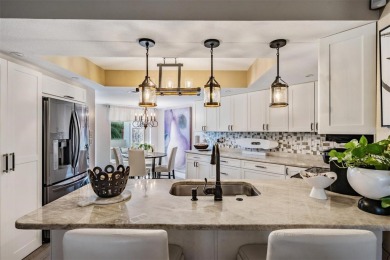 ABSOLUTELY STUNNING CONDO ON HOLE 17 TEE BOX WITH INCREDIBLE on Seven Springs Golf and Country Club in Florida - for sale on GolfHomes.com, golf home, golf lot