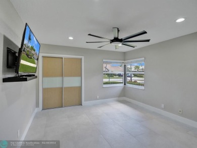 Welcome to your dream home with a New Roof 2020, Impact Windows on Boca Woods Country Club in Florida - for sale on GolfHomes.com, golf home, golf lot