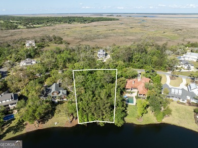 This remarkable lakefront lot spans just under one acre (0.90) on The King and Prince Golf Course, Home of the Hampton Club in Georgia - for sale on GolfHomes.com, golf home, golf lot