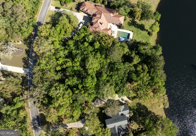 This remarkable lakefront lot spans just under one acre (0.90) on The King and Prince Golf Course, Home of the Hampton Club in Georgia - for sale on GolfHomes.com, golf home, golf lot
