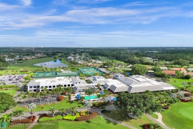 Welcome to your dream home with a New Roof 2020, Impact Windows on Boca Woods Country Club in Florida - for sale on GolfHomes.com, golf home, golf lot