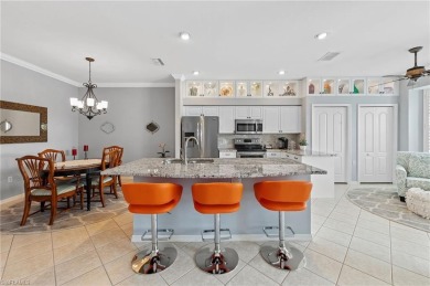 This stunning property boasts a serene lake view and updated on Stoneybrook Golf Club in Florida - for sale on GolfHomes.com, golf home, golf lot