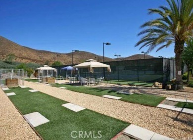 For Information Call Robinson's : This home is located in the on Menifee Lakes Country Club - Lakes in California - for sale on GolfHomes.com, golf home, golf lot