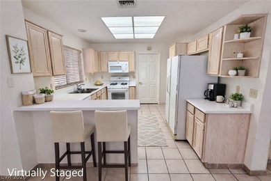 Welcome to this inviting single-story San Marino model in Sun on Highland Falls Golf Club in Nevada - for sale on GolfHomes.com, golf home, golf lot