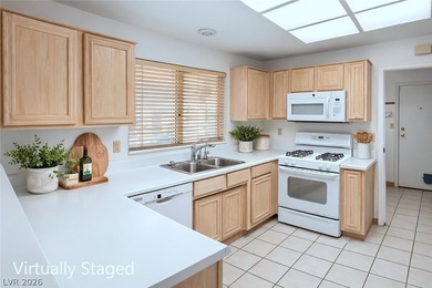 Welcome to this inviting single-story San Marino model in Sun on Highland Falls Golf Club in Nevada - for sale on GolfHomes.com, golf home, golf lot