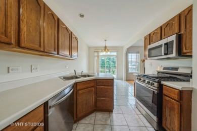 THIS 3 BEDROOM 2.5 BATHROOM TOWNHOME  FEATURES A WELL -THOUGHT on Boughton Ridge Golf Course in Illinois - for sale on GolfHomes.com, golf home, golf lot