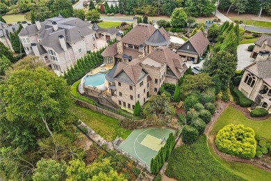 Perfectly set, overlooking the lake and the 18th Fairway at The on Manor Golf and Country Club in Georgia - for sale on GolfHomes.com, golf home, golf lot