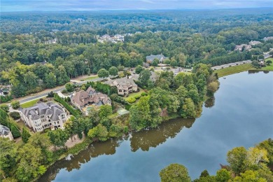 Perfectly set, overlooking the lake and the 18th Fairway at The on Manor Golf and Country Club in Georgia - for sale on GolfHomes.com, golf home, golf lot