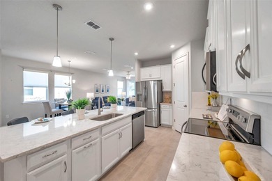 Don't miss your chance to own the stunning Topsail model home in on The Golf Club of Cypress Creek in Florida - for sale on GolfHomes.com, golf home, golf lot