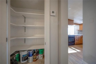 This home is the perfect blend of comfort, charm, function, and on Linn Valley Lakes - Deer Trace Golf Course in Kansas - for sale on GolfHomes.com, golf home, golf lot