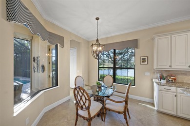 Driving through the gates of prestigious Country Club East, you on Ritz-Carlton Members Golf Club in Florida - for sale on GolfHomes.com, golf home, golf lot