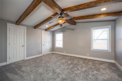 This home is the perfect blend of comfort, charm, function, and on Linn Valley Lakes - Deer Trace Golf Course in Kansas - for sale on GolfHomes.com, golf home, golf lot