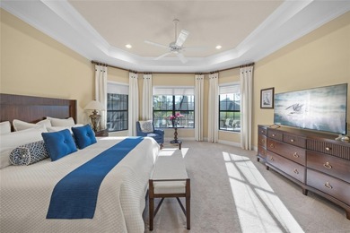 Driving through the gates of prestigious Country Club East, you on Ritz-Carlton Members Golf Club in Florida - for sale on GolfHomes.com, golf home, golf lot