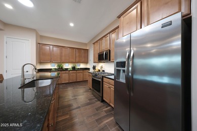 Highly desired 3-bedroom, 2.5-bath home with flex room is on Verrado Golf Club - Victory in Arizona - for sale on GolfHomes.com, golf home, golf lot