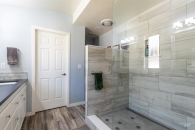 Welcome to 4023 N Bayou Lane, a serene and stylish single-level on Plantation Country Club in Idaho - for sale on GolfHomes.com, golf home, golf lot