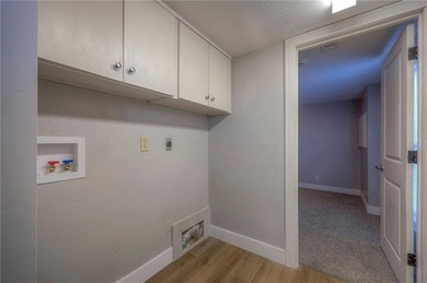 This home is the perfect blend of comfort, charm, function, and on Linn Valley Lakes - Deer Trace Golf Course in Kansas - for sale on GolfHomes.com, golf home, golf lot