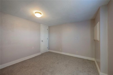 This home is the perfect blend of comfort, charm, function, and on Linn Valley Lakes - Deer Trace Golf Course in Kansas - for sale on GolfHomes.com, golf home, golf lot