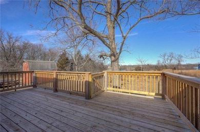 This home is the perfect blend of comfort, charm, function, and on Linn Valley Lakes - Deer Trace Golf Course in Kansas - for sale on GolfHomes.com, golf home, golf lot