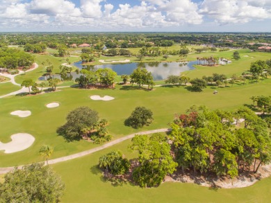 Unmatched, spectacular views of the lake and golf course await on PGA National Golf Club in Florida - for sale on GolfHomes.com, golf home, golf lot