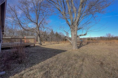 This home is the perfect blend of comfort, charm, function, and on Linn Valley Lakes - Deer Trace Golf Course in Kansas - for sale on GolfHomes.com, golf home, golf lot