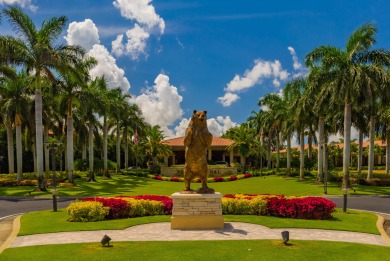 Unmatched, spectacular views of the lake and golf course await on PGA National Golf Club in Florida - for sale on GolfHomes.com, golf home, golf lot