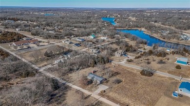 This home is the perfect blend of comfort, charm, function, and on Linn Valley Lakes - Deer Trace Golf Course in Kansas - for sale on GolfHomes.com, golf home, golf lot