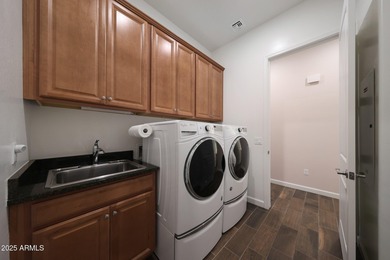 Highly desired 3-bedroom, 2.5-bath home with flex room is on Verrado Golf Club - Victory in Arizona - for sale on GolfHomes.com, golf home, golf lot