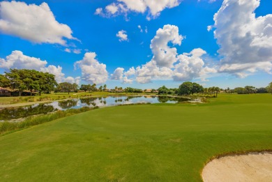 Unmatched, spectacular views of the lake and golf course await on PGA National Golf Club in Florida - for sale on GolfHomes.com, golf home, golf lot