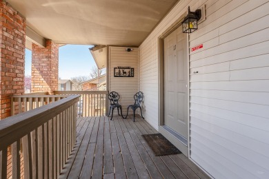 Indulge in cozy cabin vibes with this inviting 2-bedroom on Pointe Royale Village Country Club in Missouri - for sale on GolfHomes.com, golf home, golf lot