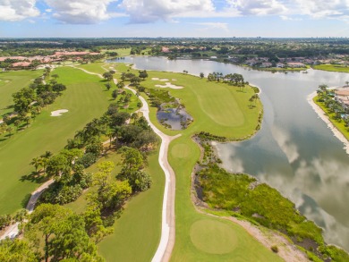 Unmatched, spectacular views of the lake and golf course await on PGA National Golf Club in Florida - for sale on GolfHomes.com, golf home, golf lot