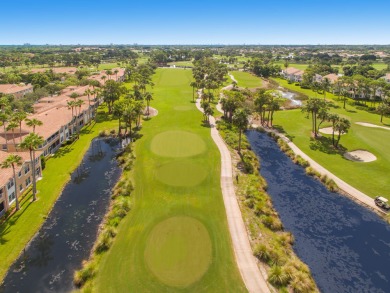 Unmatched, spectacular views of the lake and golf course await on PGA National Golf Club in Florida - for sale on GolfHomes.com, golf home, golf lot