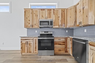 This brand new home is just a short easy walk to the community's on Kimberling City Golf Club in Missouri - for sale on GolfHomes.com, golf home, golf lot