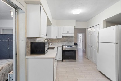 Charming 3 bedrooms /2 bathrooms Home in Sunrise Golf Village on Sunrise Country Club in Florida - for sale on GolfHomes.com, golf home, golf lot