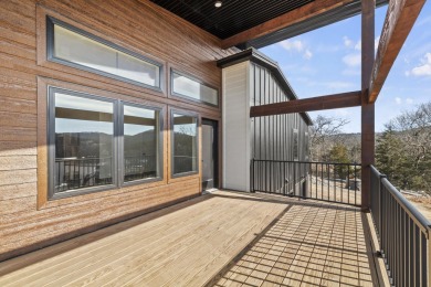 This brand new home is just a short easy walk to the community's on Kimberling City Golf Club in Missouri - for sale on GolfHomes.com, golf home, golf lot