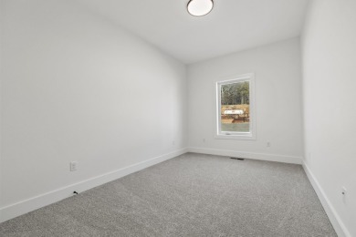 This brand new home is just a short easy walk to the community's on Kimberling City Golf Club in Missouri - for sale on GolfHomes.com, golf home, golf lot