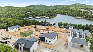 This brand new home is just a short easy walk to the community's on Kimberling City Golf Club in Missouri - for sale on GolfHomes.com, golf home, golf lot