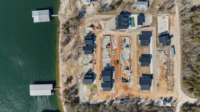 This brand new home is just a short easy walk to the community's on Kimberling City Golf Club in Missouri - for sale on GolfHomes.com, golf home, golf lot