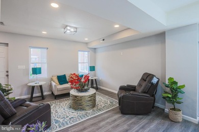 This charming end-of-row townhouse, built in 1924, seamlessly on Clifton Park Golf Course in Maryland - for sale on GolfHomes.com, golf home, golf lot