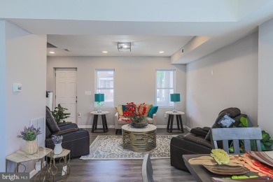 This charming end-of-row townhouse, built in 1924, seamlessly on Clifton Park Golf Course in Maryland - for sale on GolfHomes.com, golf home, golf lot