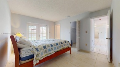 Discover your dream home in this beautifully designed residence on Palmetto Golf Course in Florida - for sale on GolfHomes.com, golf home, golf lot