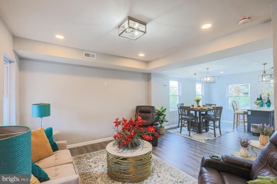 This charming end-of-row townhouse, built in 1924, seamlessly on Clifton Park Golf Course in Maryland - for sale on GolfHomes.com, golf home, golf lot
